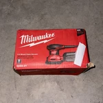 New Milwaukee 6033-21 1/4 Sheet Palm Sander. Fixed Price $69.99.