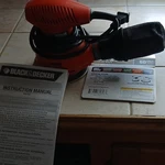 Black+decker RO100 5 In Palm Grip Random Orbit Sander Orange Rotary Tool. Fixed Price $24.40.