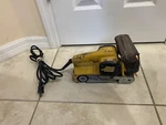 Dewalt DW430, Heavy Duty Belt Sander. Fixed Price $59.99.
