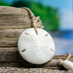 Sand Dollar Hand Carved Water-buffalo Bone By Bali Necklaces. Fixed Price $30.00.