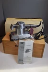 New Collectible Commemorative Porter Cable 505 Pad Sander 25TH Anniv Oak Case. Fixed Price $499.99.